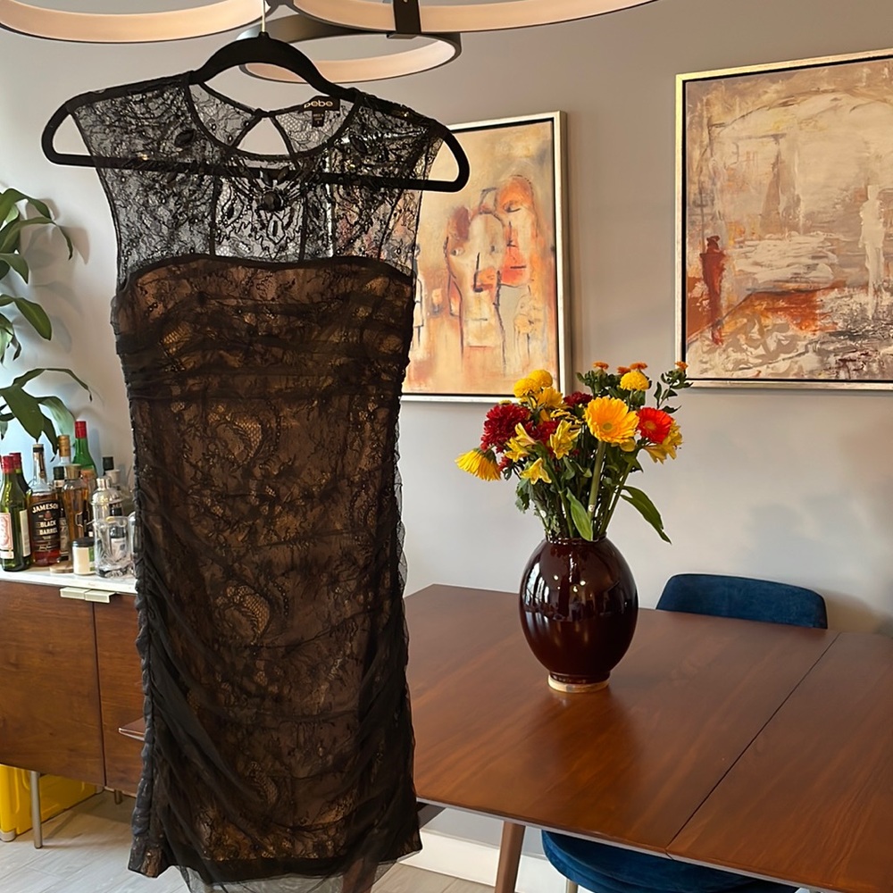 Bebe lace dress with jewels. Black with beige lining. Size S.